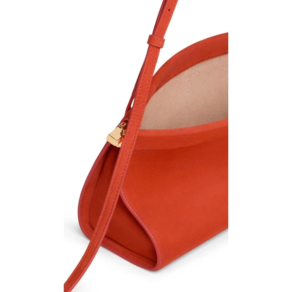 Alaia Le Click East West Medium Bag in Nubuck, Burnt Orange | Shoulder & Crossbody Bags | Coveti