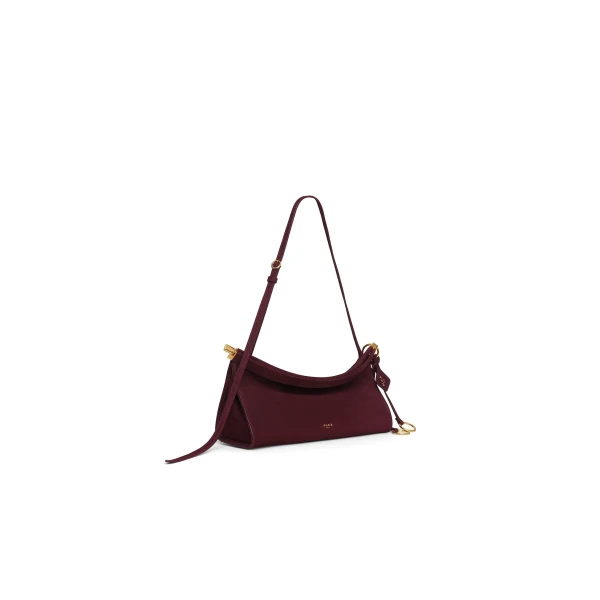 Alaia Le Click East West Medium Bag in Nubuck, Garnet Red | Shoulder & Crossbody Bags | Coveti