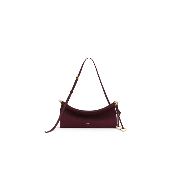 Alaia Le Click East West Medium Bag in Nubuck, Garnet Red | Shoulder & Crossbody Bags | Coveti