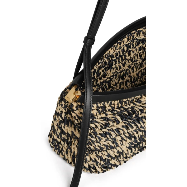 Alaia Le Click East West Medium Bag in Raffia, Natural and Black | Shoulder & Crossbody Bags | Coveti