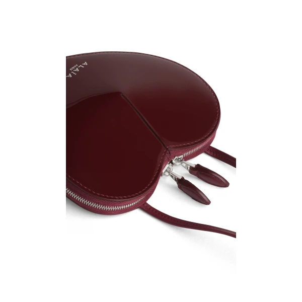 Alaia Le Coeur Small Bag in Patent Leather, Garnet Red | Mini Bags | Coveti