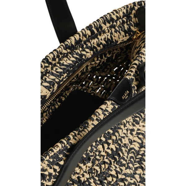 Alaia Le Panier East West Large Bag in Raffia, Natural and Black | Totes & Top-Handle Bags | Coveti