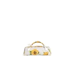 Alaia Le Teckel Clutch in Flower Print, White and Yellow | Clutch Bags | Coveti