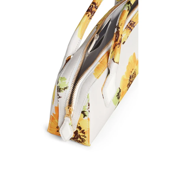 Alaia Le Teckel Clutch in Flower Print, White and Yellow | Clutch Bags | Coveti