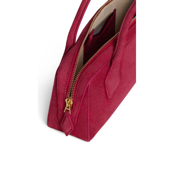 Alaia Le Teckel Clutch in Suede, Raspberry | Clutch Bags | Coveti