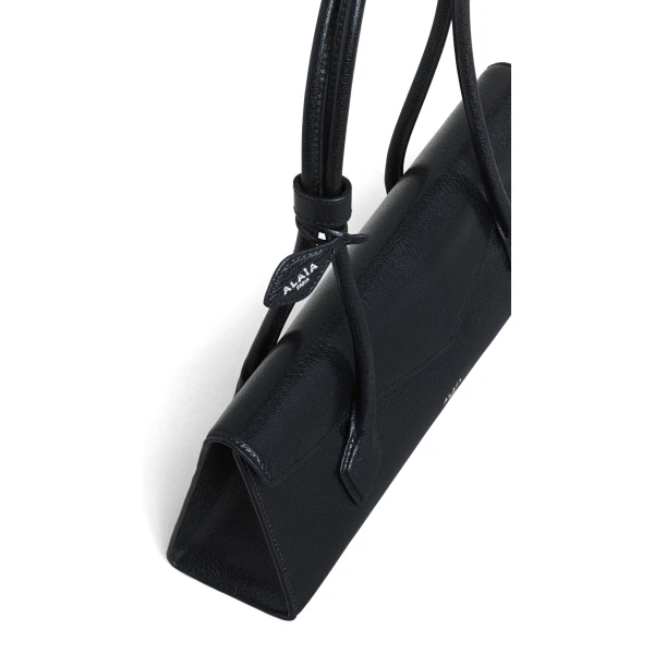 Alaia Le Teckel Flap Medium Bag in Shiny Goatskin, Black | Shoulder & Crossbody Bags | Coveti