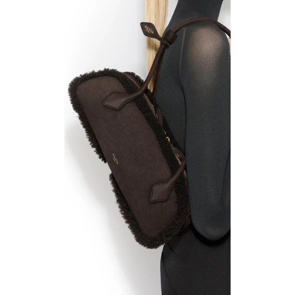 Alaia Le Teckel Medium Bag in Merino Shearling, Chestnut | Shoulder & Crossbody Bags | Coveti