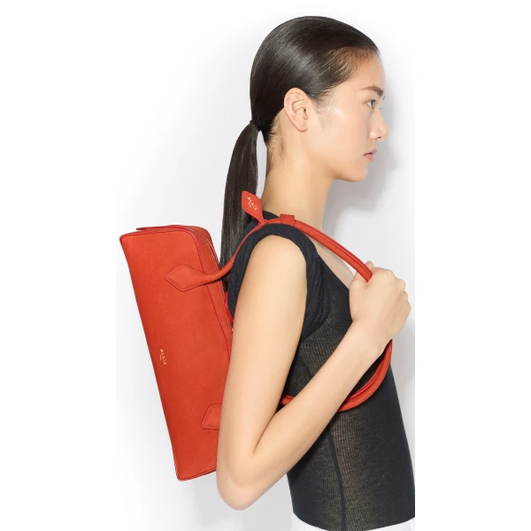Alaia Le Teckel Medium Bag in Nubuck, Burnt Orange | Shoulder & Crossbody Bags | Coveti