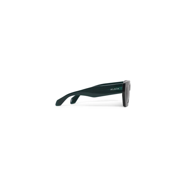 Alaia Melted Rectangular Sunglasses in Green | Sunglasses | Coveti