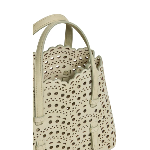 Alaia Mina 20 Bag in Perforated Vienne Nubuck, Almond Green | Mini Bags | Coveti