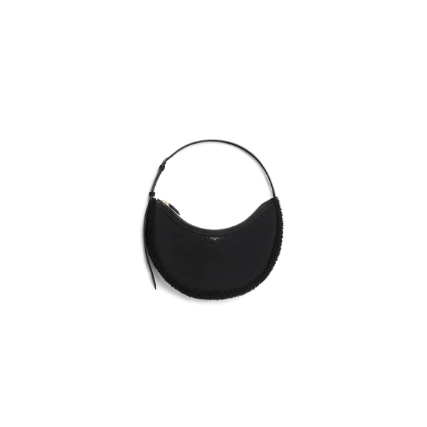 Alaia One Piece Demi Lune Bag in Merino Shearling, Black | Shoulder & Crossbody Bags | Coveti