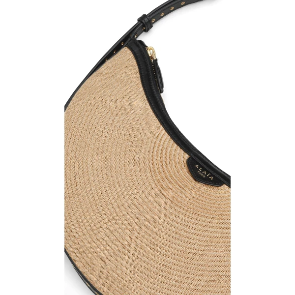Alaia One Piece Demi Lune Bag in Paper Straw, Natural | Shoulder & Crossbody Bags | Coveti