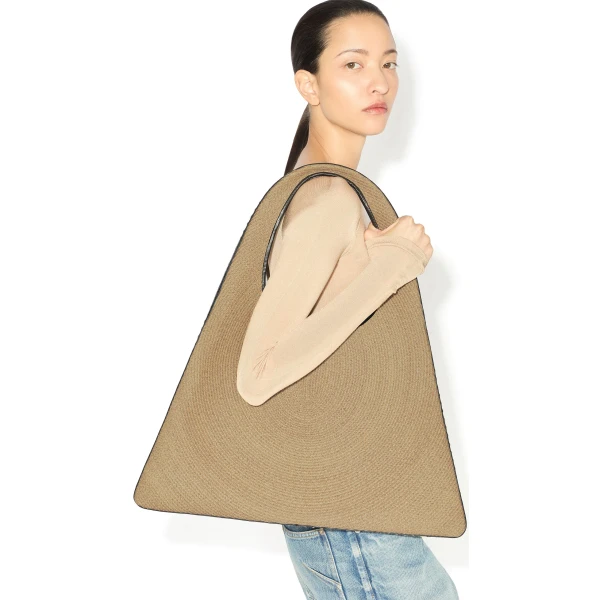 Alaia One Piece Hobo Bag in Paper Straw, Natural | Shoulder & Crossbody Bags | Coveti