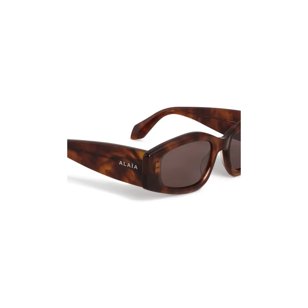 Alaia Oval Sunglasses in Dark Havana | Sunglasses | Coveti
