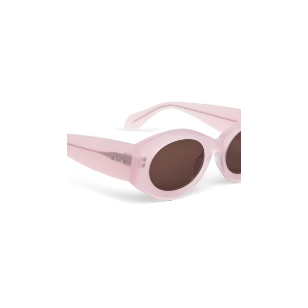 Alaia Oval Sunglasses in Pink and Brown | Sunglasses | Coveti
