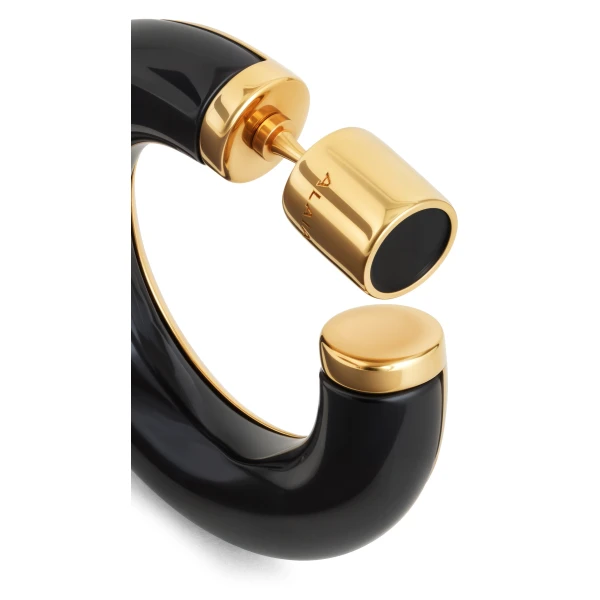 Alaia Ray Hoops in Gold and Black | Earrings | Coveti