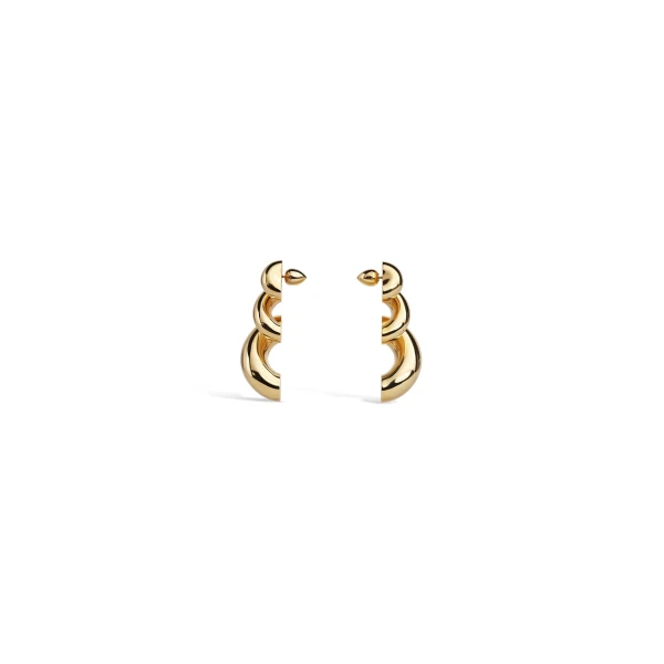Alaia Torsion Earrings in Gold | Earrings | Coveti