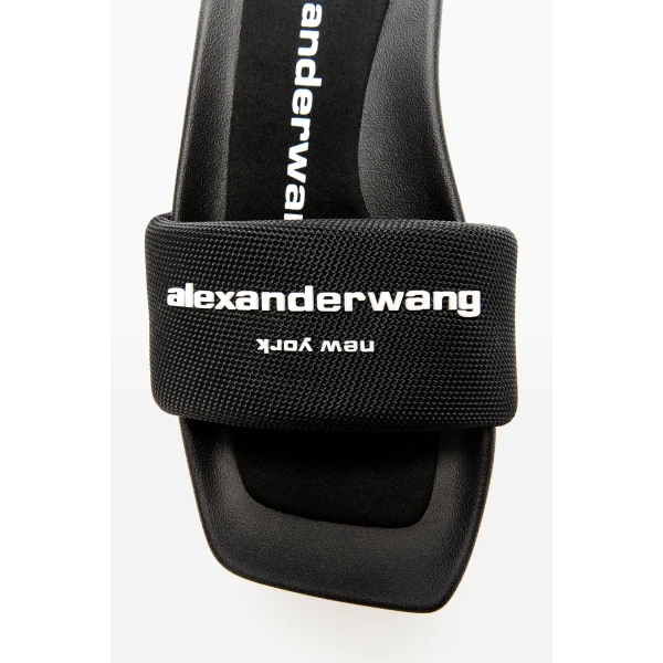 Alexander Wang 85mm Platform Slide in Black | Flip Flops & Slides | Coveti