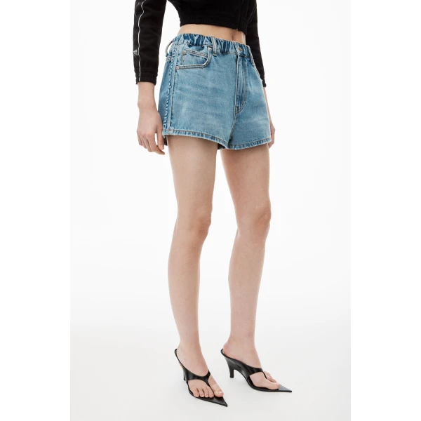 Alexander Wang Balloon Logo-Embossed Denim Marathon Short in Vintage Light Indigo | Denim Shorts | Coveti
