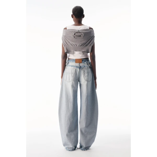 Alexander Wang Blow Up Logo-Embossed Mid-Rise Inverted Jean in Inverted Bleach Blue | Denim | Coveti