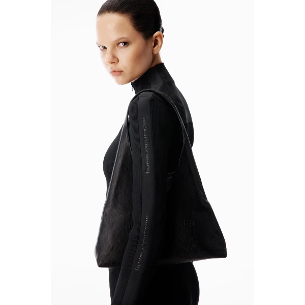 Alexander Wang Debossed Logo Fitted Jacket in Black | Jackets | Coveti