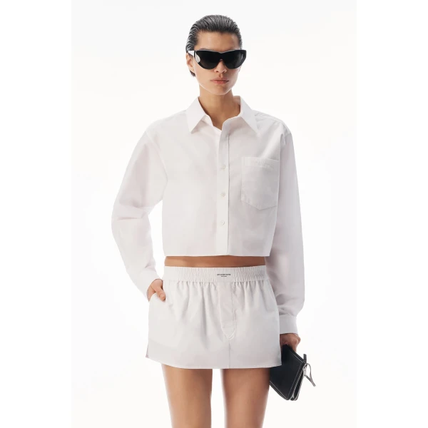 Alexander Wang Embroidered Logo Cropped Shirt in White | Shirts | Coveti