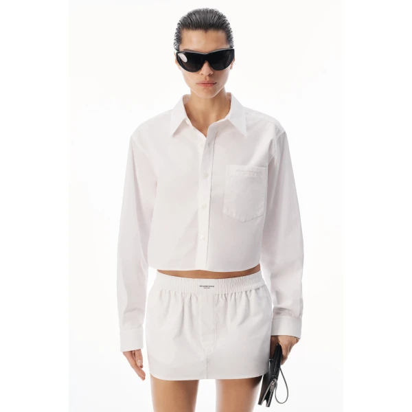 Alexander Wang Embroidered Logo Cropped Shirt in White | Shirts | Coveti