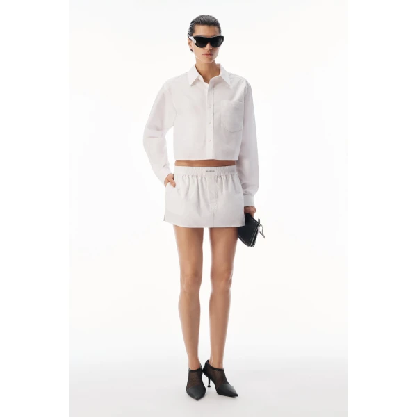Alexander Wang Embroidered Logo Cropped Shirt in White | Shirts | Coveti