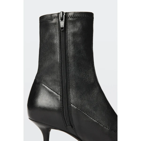 Alexander Wang Fei 65mm Stretch Ankle Boot in Black | Boots | Coveti