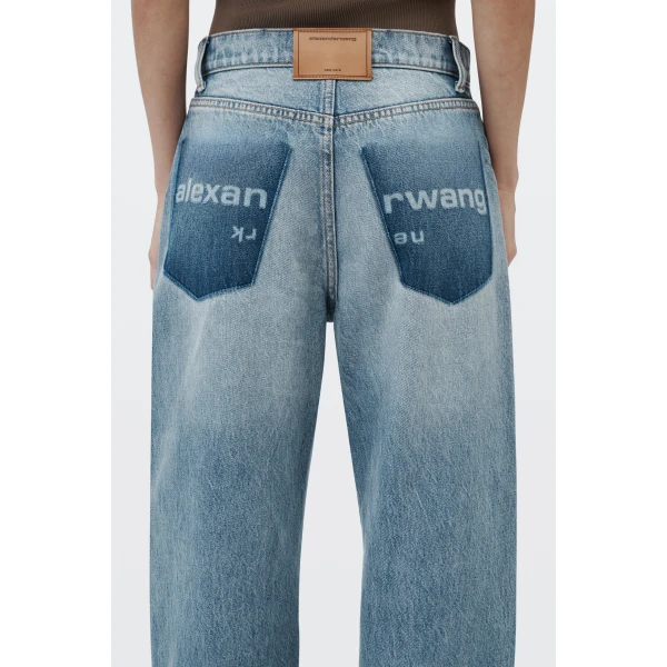 Alexander Wang Float Mid-Rise Relaxed Shadow Pocket Jean in Authentic Light Indigo | Denim | Coveti