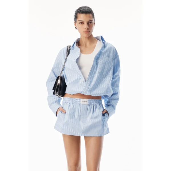 Alexander Wang Mid-Rise Mini Boxer Skort in Light Blue Stripe | Mini Skirts | Coveti