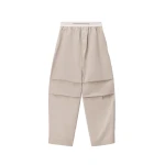 Alexander Wang Mid-Rise Pleated Wide-Leg Pant with Logo Elastic Waist in Stone | Coveti