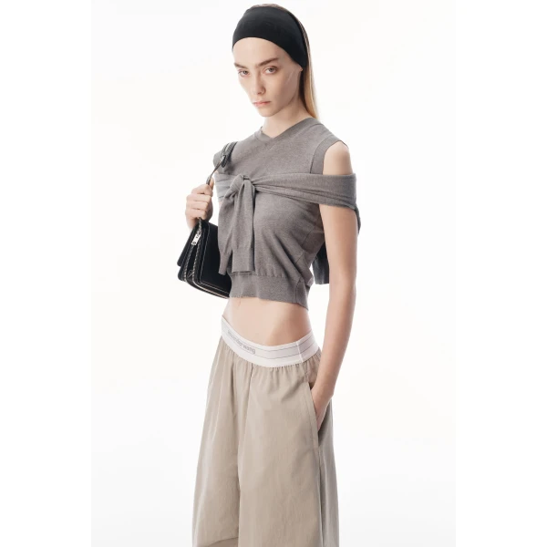 Alexander Wang Mid-Rise Pleated Wide-Leg Pant with Logo Elastic Waist in Stone | Wide leg pants | Coveti