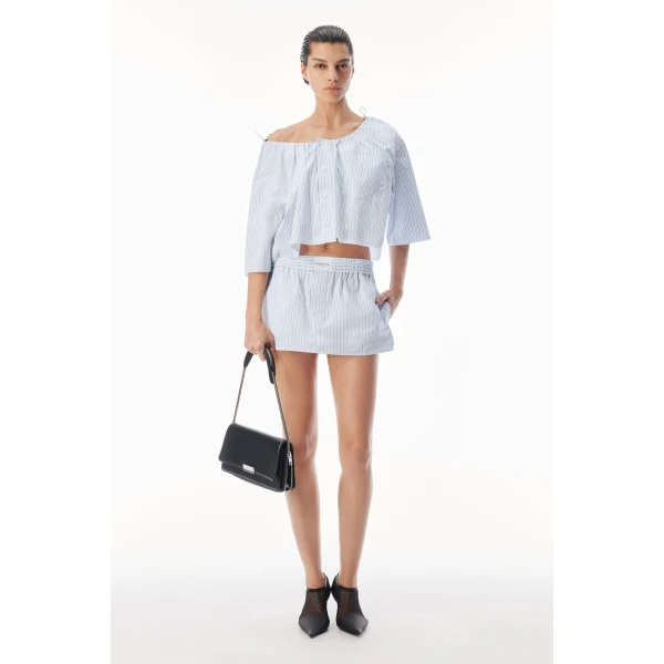 Alexander Wang Off-Shoulder Cropped Shirt with Bungee Drawcord in White and Blue | Shirts | Coveti