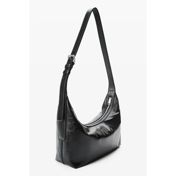 Alexander Wang Punch Sling Crossbody Bag in Black | Shoulder & Crossbody Bags | Coveti