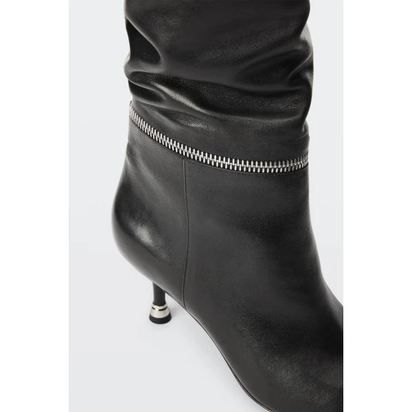 Alexander Wang Slasher 65mm Zip Slouch Boot in Black | Boots | Coveti