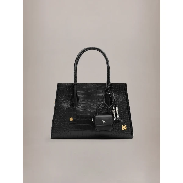 Amiri Braided Keychain in Black, view 3 | Bag charms | Coveti
