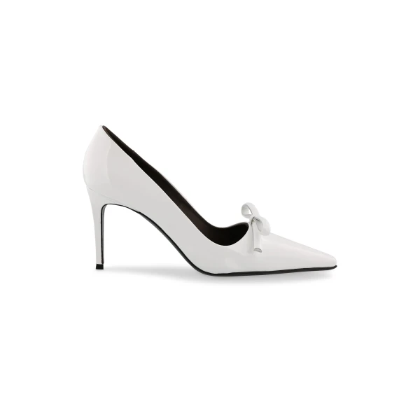 Bernadette Bowtie Lacquered High Heel Pump in Ivory | Heels | Coveti
