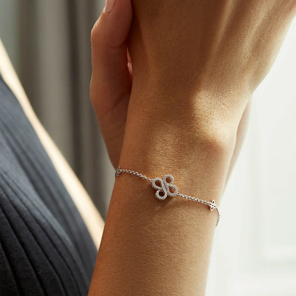 Boodles Be Boodles White Gold Charm Bracelet | Fine Bracelets | Coveti