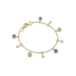 Boodles Beach Sapphire Aquamarine Yellow Gold Bracelet | Fine Bracelets | Coveti