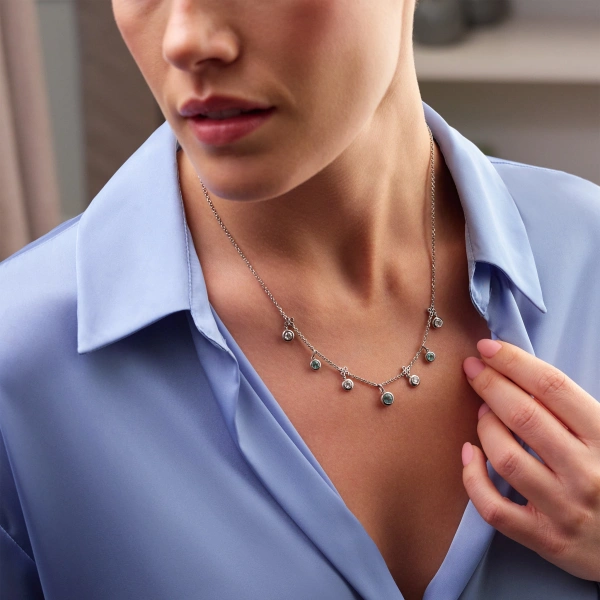 Boodles Beach Seven Stone Platinum Diamond and Paraiba Tourmaline Necklace | Fine Necklaces | Coveti