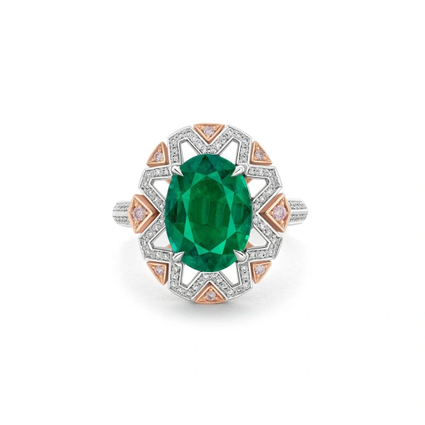 Boodles Fifth Avenue Oval Emerald Platinum and Rose Gold Ring | Fine Rings | Coveti