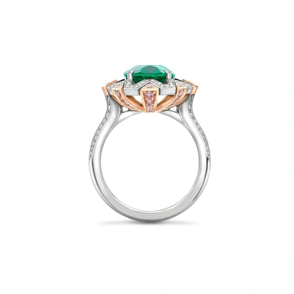 Boodles Fifth Avenue Oval Emerald Platinum and Rose Gold Ring | Fine Rings | Coveti
