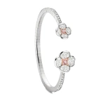 Boodles Posie Platinum and Rose Gold Diamond Bangle | Fine Bracelets | Coveti