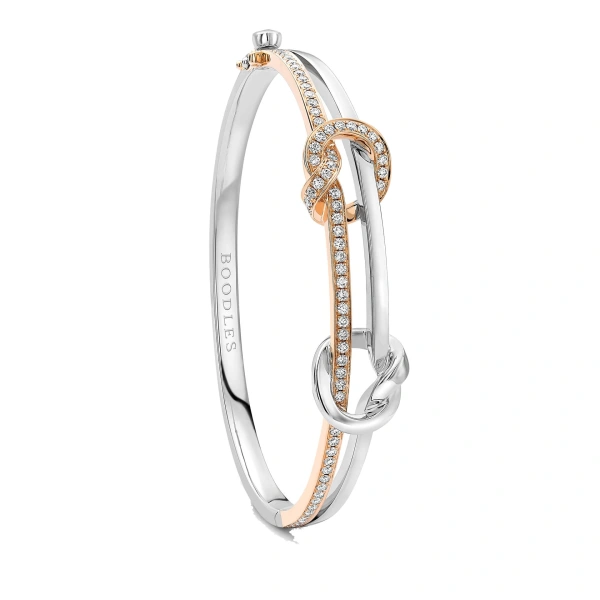 Boodles The Knot White and Rose Gold Diamond Bangle | Fine Bracelets | Coveti