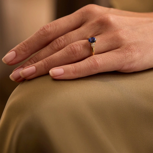 Boodles Trilogy Cupid Oval Sapphire Yellow Gold Ring | Fine Rings | Coveti