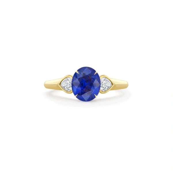 Boodles Trilogy Cupid Oval Sapphire Yellow Gold Ring | Fine Rings | Coveti