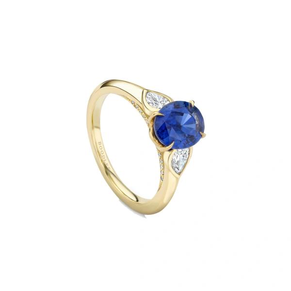 Boodles Trilogy Cupid Oval Sapphire Yellow Gold Ring | Fine Rings | Coveti