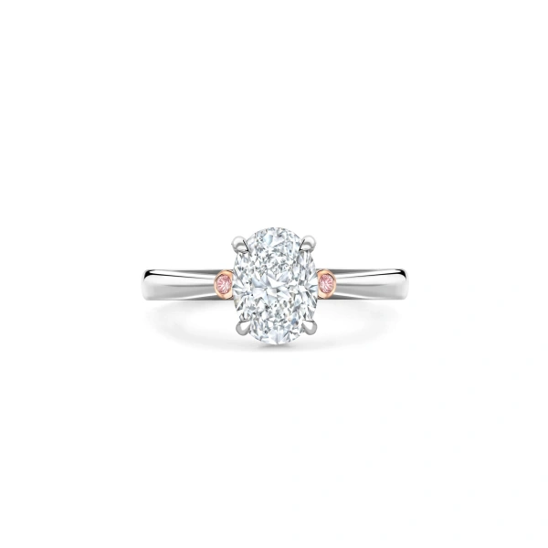 Boodles Trilogy Oval Diamond Pink Diamond Shoulders Platinum Ring | Fine Rings | Coveti
