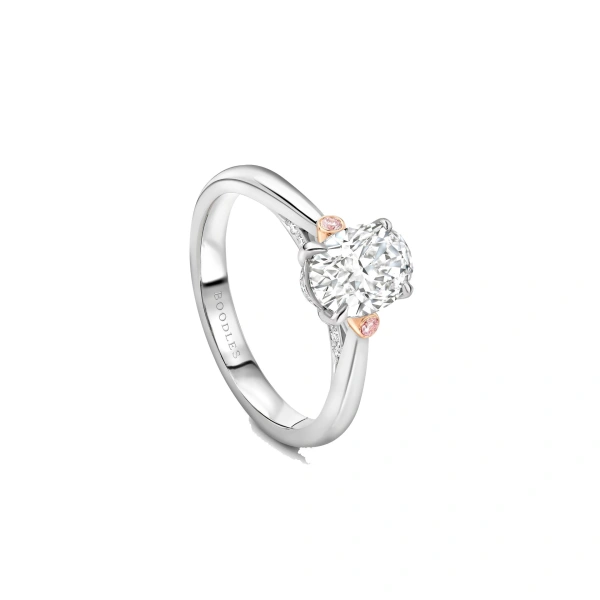 Boodles Trilogy Oval Diamond Pink Diamond Shoulders Platinum Ring | Fine Rings | Coveti